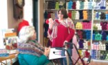 Karen sporting her crochet hook cane, talking with Martha