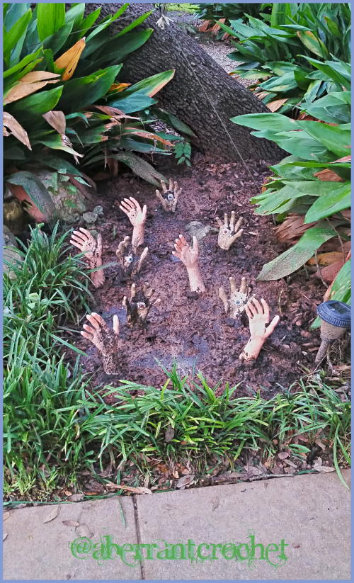 Patch of Doctor Who Hand Mines In The Flower Bed For Halloween